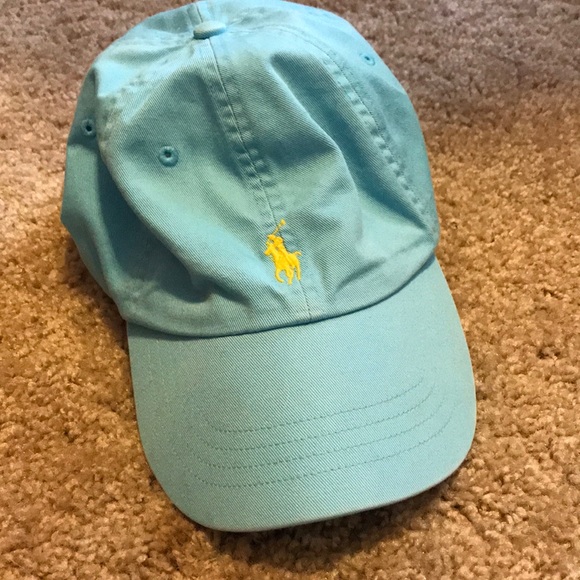 blue polo hat with yellow horse